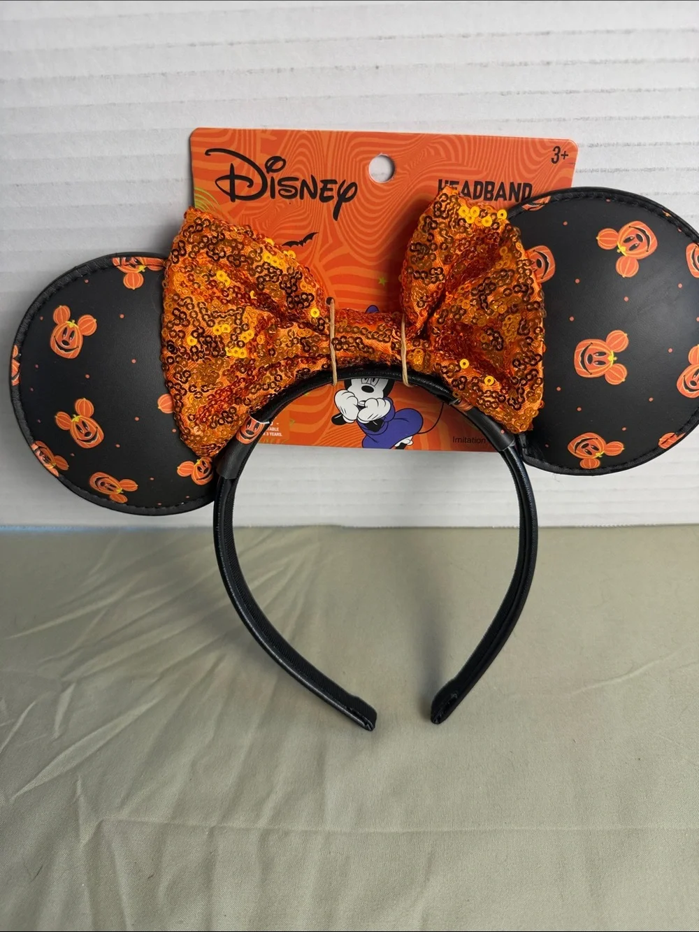 Disney Black Minnie Ears Headband with Orange Sequin Bow